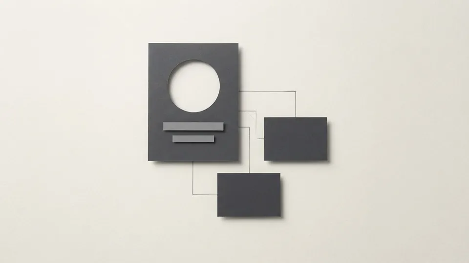 A graphite paper card with a round cut-out portrait space and two blank bars, joined by fine lines to two smaller cards